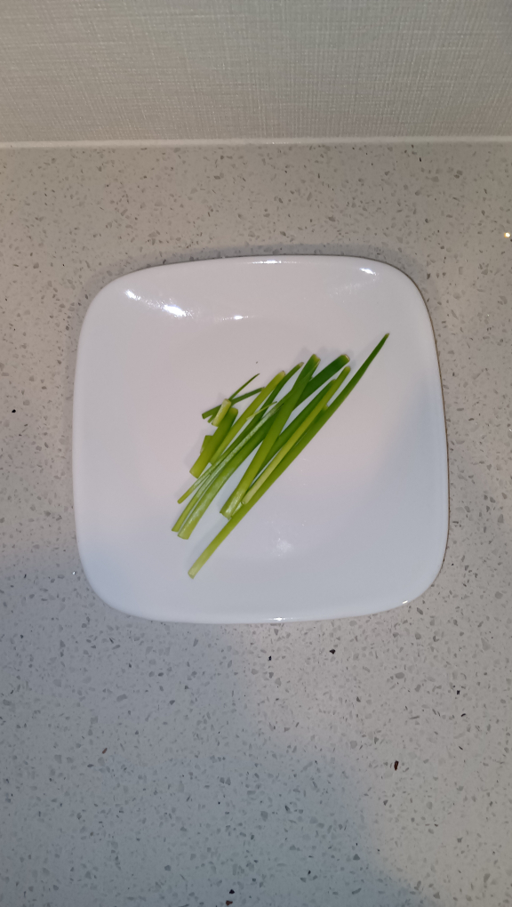 収穫したネギの写真
